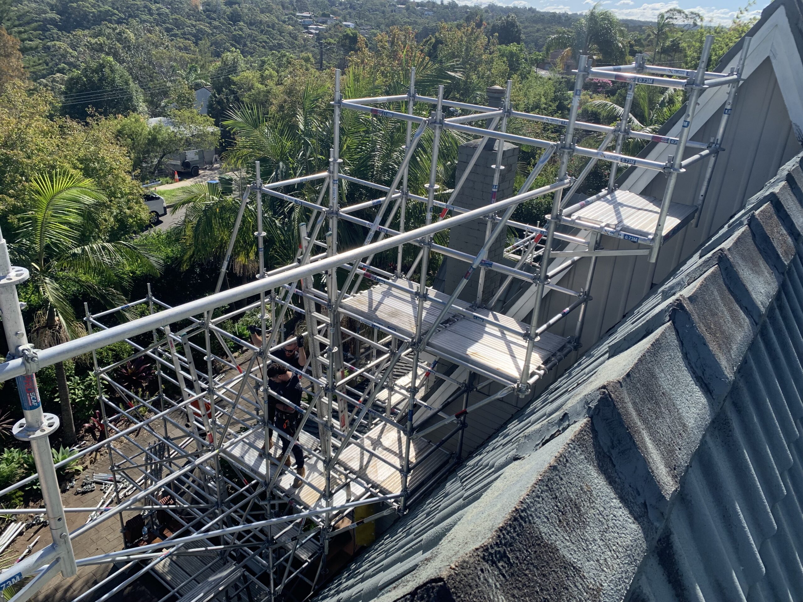 Aluminium scaffold by Express Scaffolding in East Killara Sydney built on a 60 degree angle residential roof