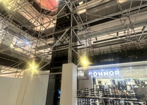 Multi-level aluminium scaffolding for balustrade upgrade alongside open retail stores at Westfield Parramatta Sydney
